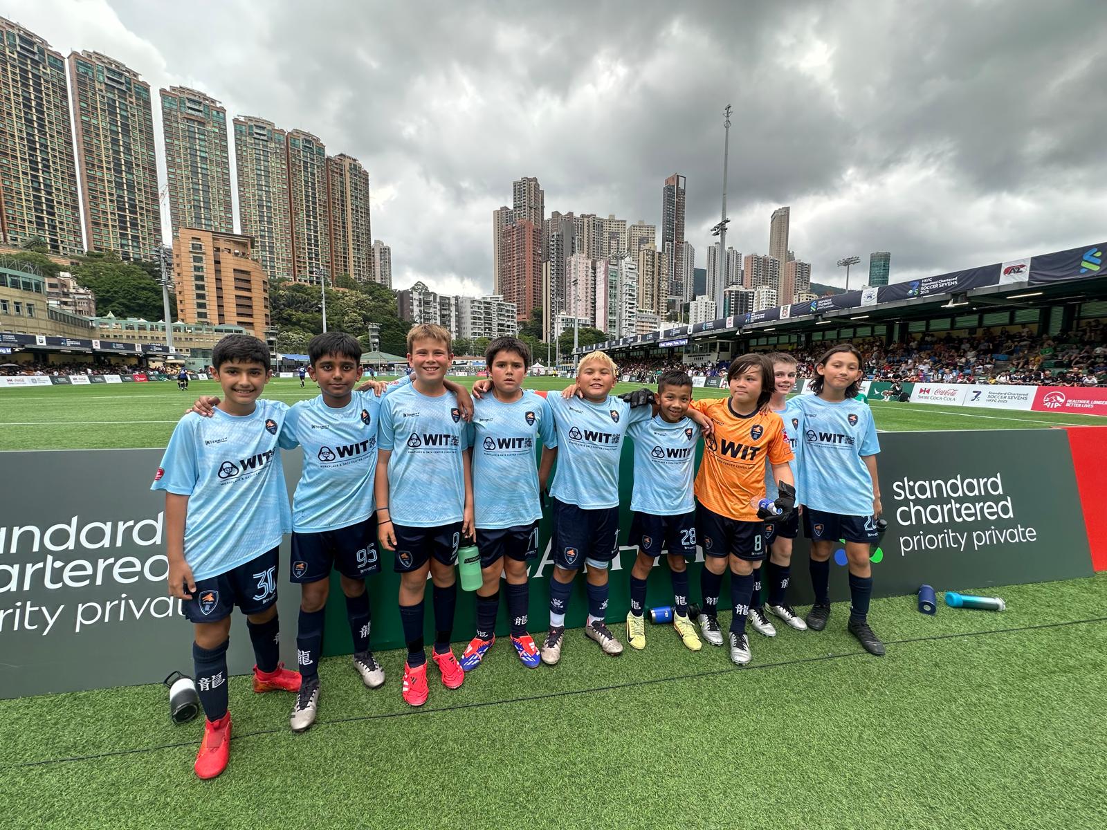 A Dragons team lined up at a tournament in Hong Kong Stadium