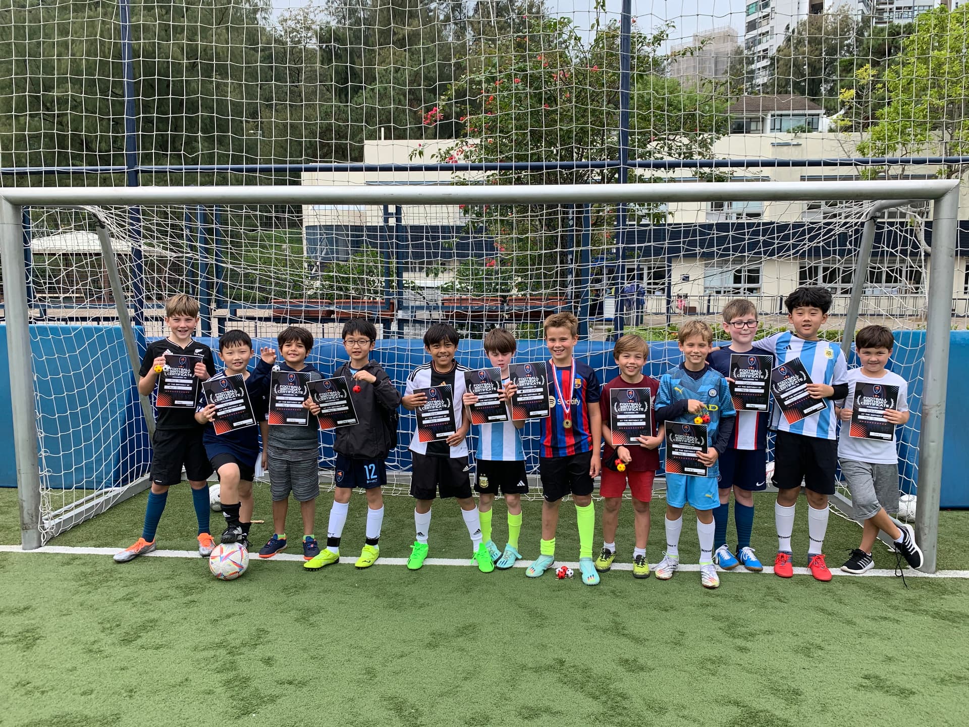 Children celebrating at a HK Dragons football birthday party