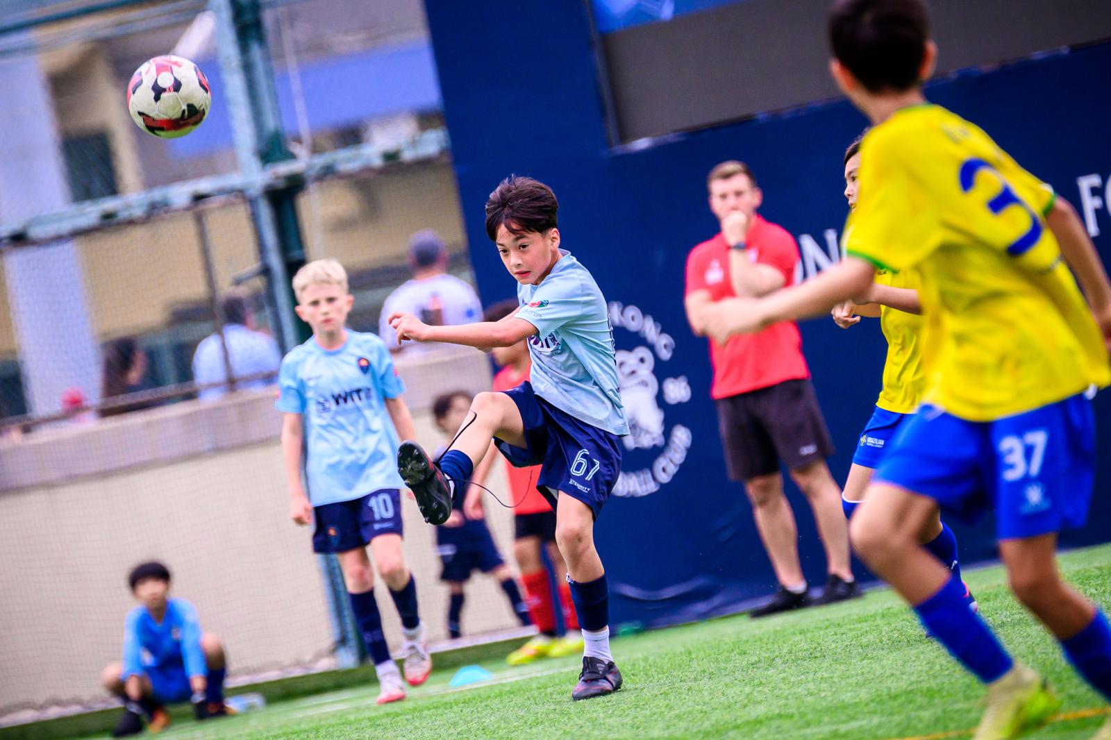 Dragons players competing against opponents in yellow