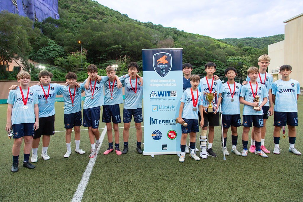 Another Dragons squad collecting medals at the 2025 ceremony
